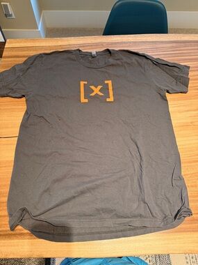 American Apparel Black Short Sleeve Tee with Orange Bracket Logo